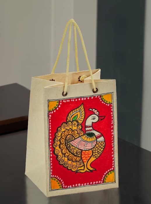 Sanskriti Kalamkari Gift Bag – Orange Base Peacock (Small)